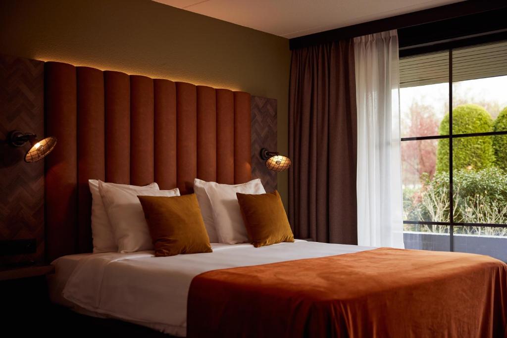 登纳霍夫范德瓦尔克酒店客房内的一张或多张床位