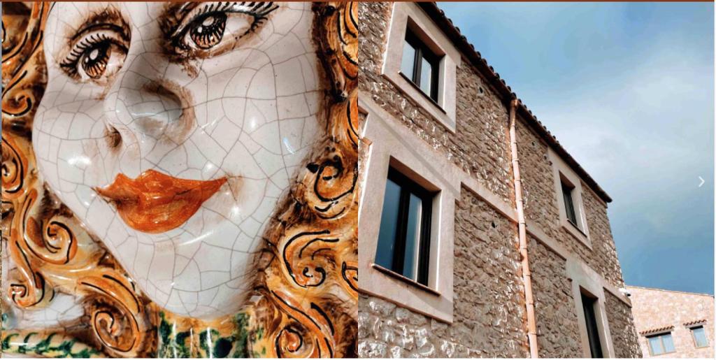 恩纳Agriturismo Borgo Furma的建筑物一侧画的脸