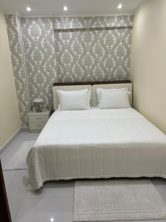 Wonderful 1 bedroom apartment in Luanda客房内的一张或多张床位