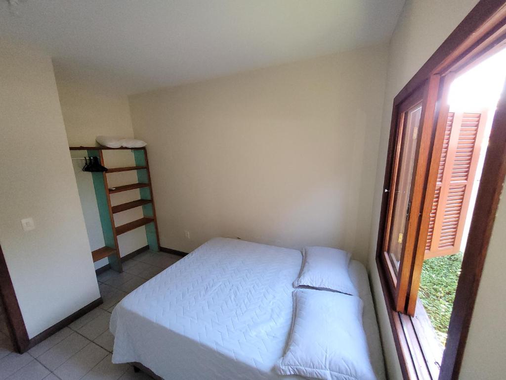 Partiu Praia SC- Pinheira客房内的一张或多张床位