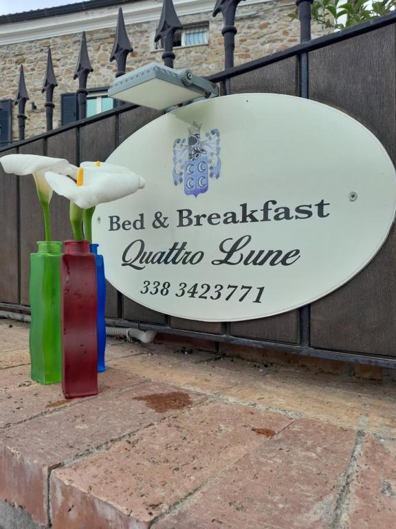 Prignano CilentoB&B Quattro Lune的杜拉托弗莱莫住宿加早餐旅馆的标志