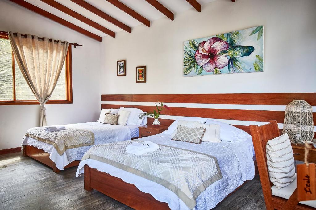 Villa Lu Amazon Ecolodge客房内的一张或多张床位