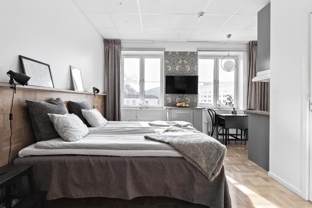 Forenom Aparthotel Stockholm Bromma客房内的一张或多张床位