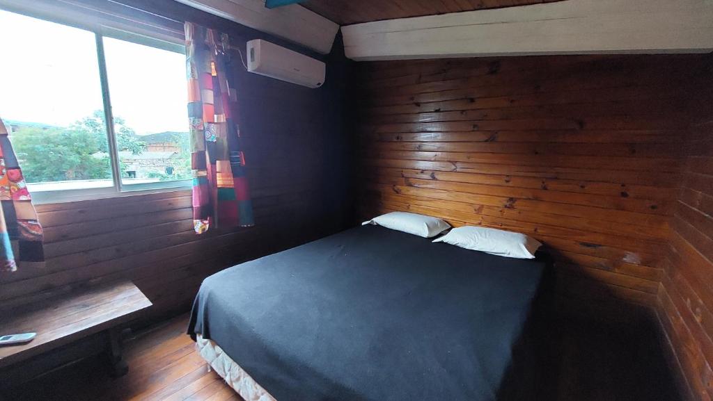 The Host Puerto Iguazú客房内的一张或多张床位