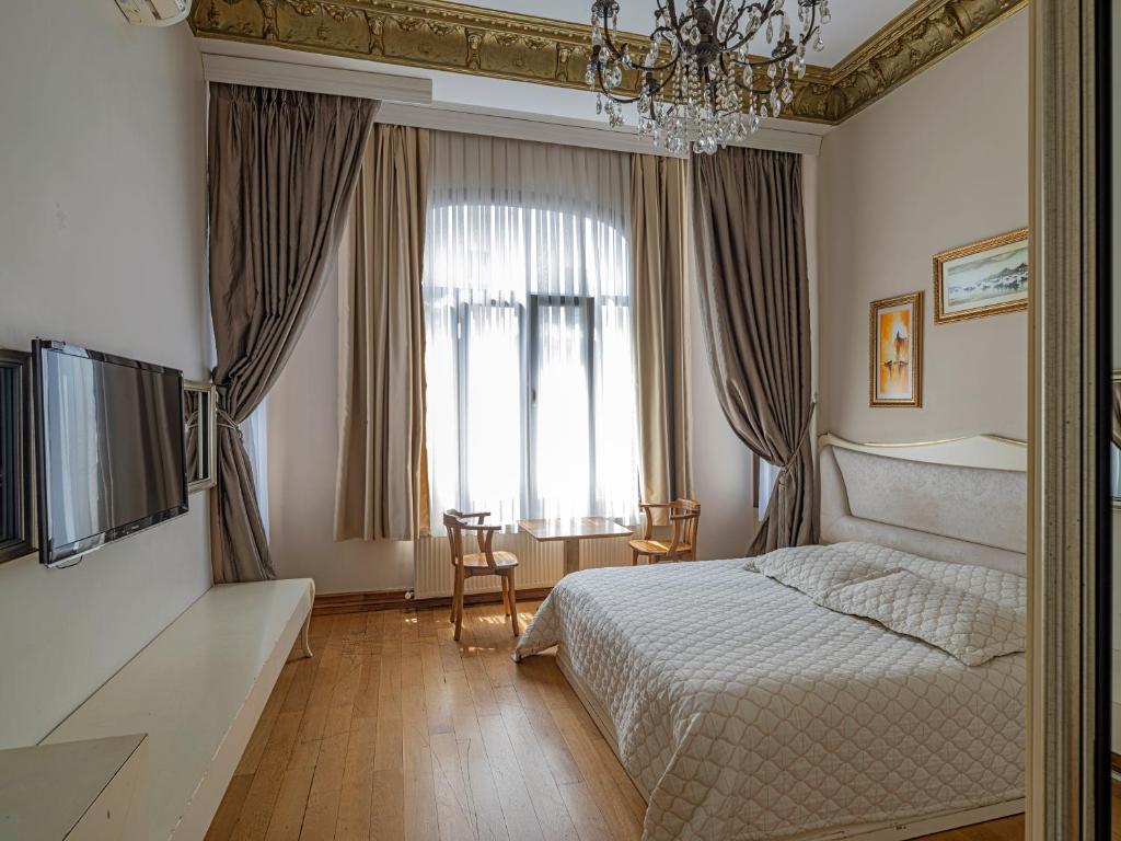 Ragip Pasha Apartments客房内的一张或多张床位