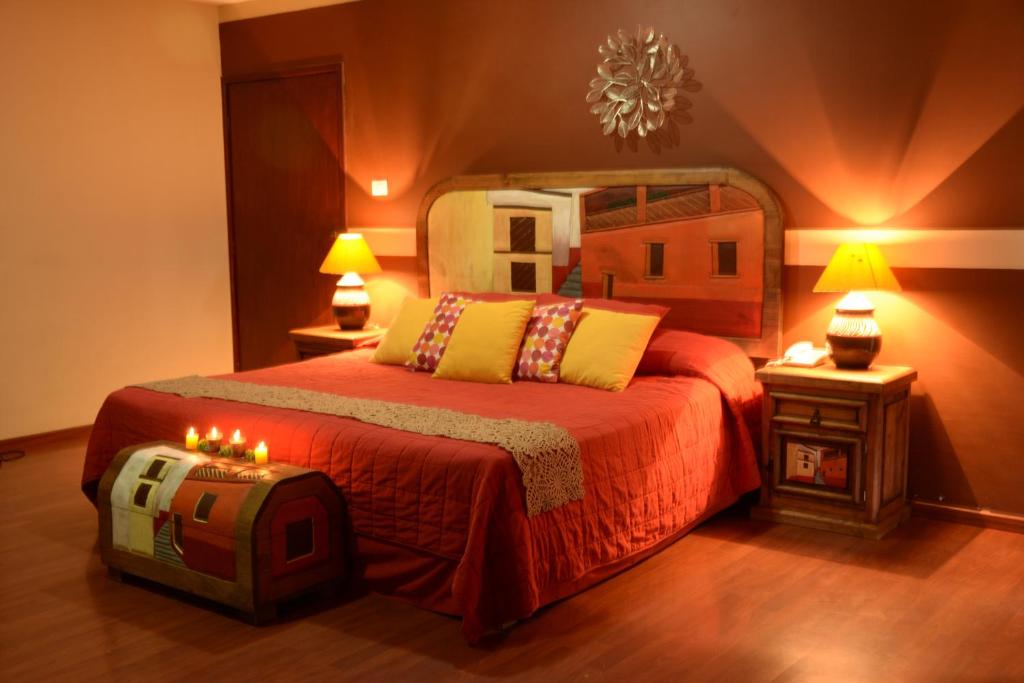 Hotel Chocolate Tradicional客房内的一张或多张床位