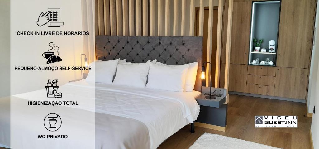 维塞乌Viseu Guest Inn的一间卧室配有一张带白色床罩的床