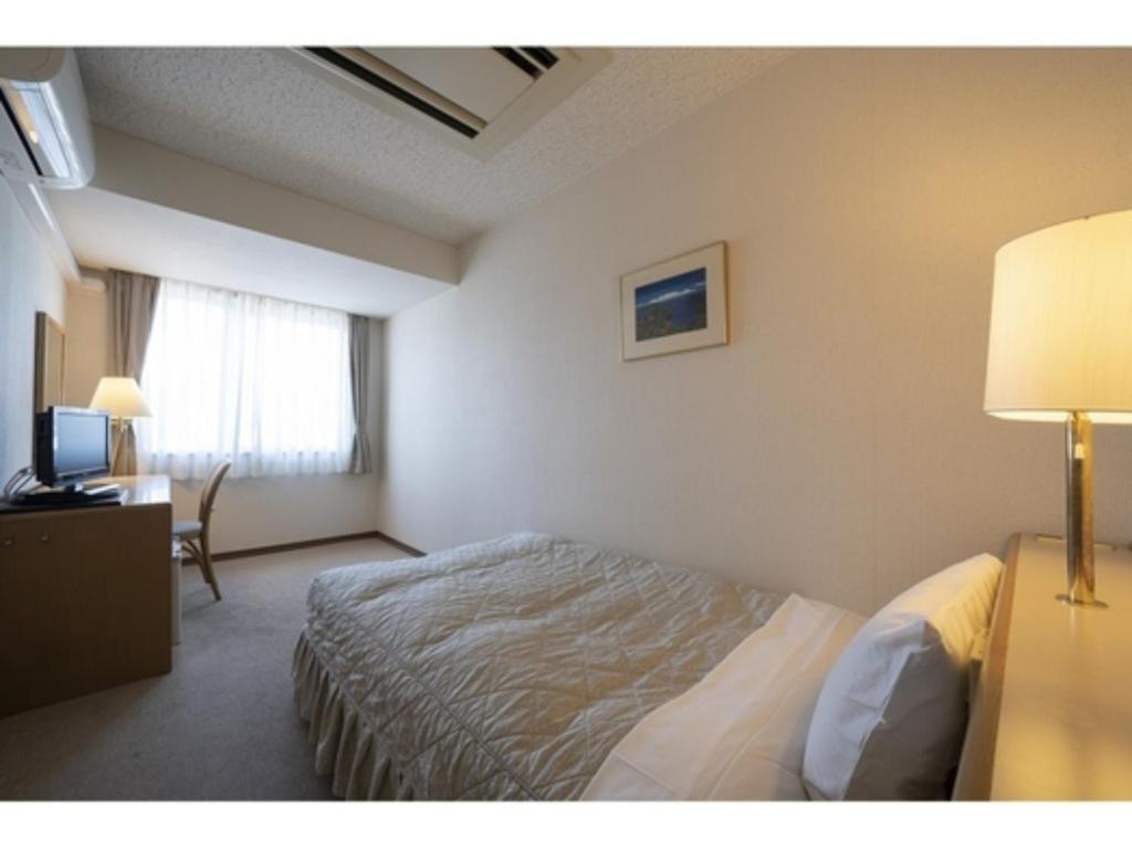 Seto Park Hotel - Vacation STAY 83725v客房内的一张或多张床位