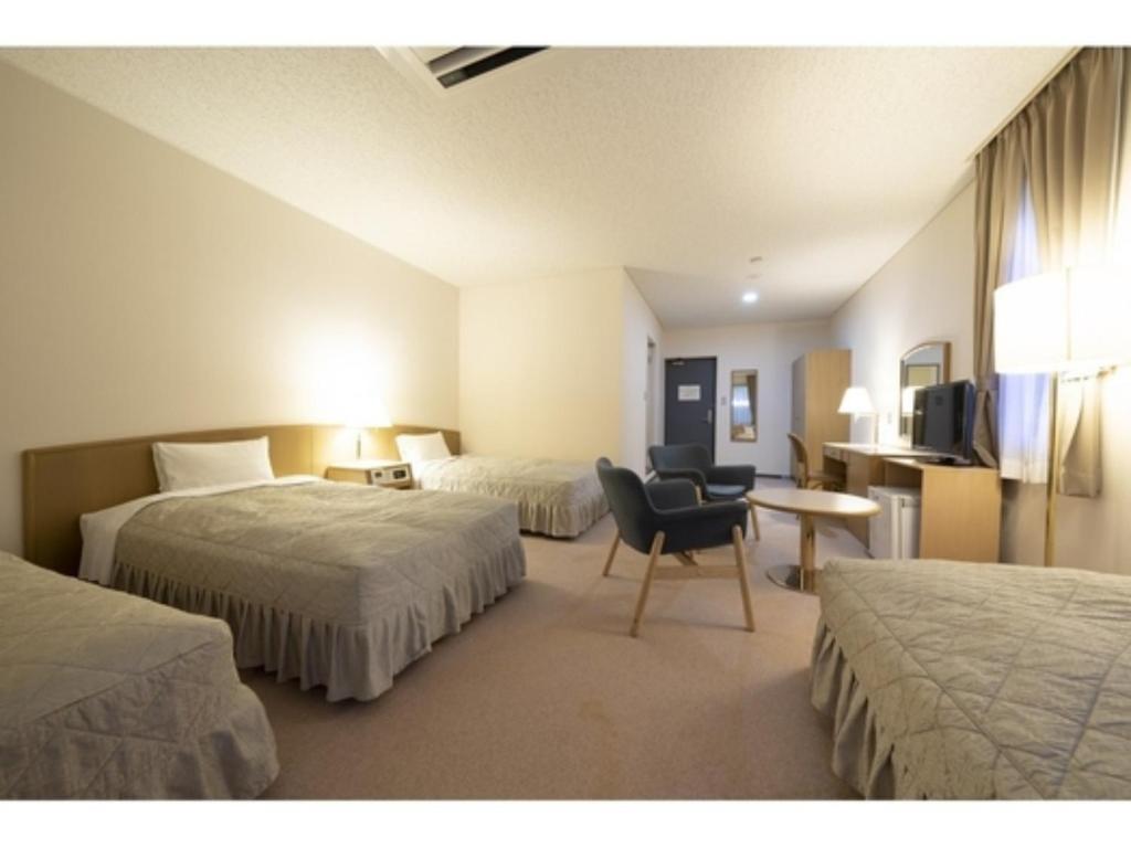 Seto Park Hotel - Vacation STAY 83757v客房内的一张或多张床位