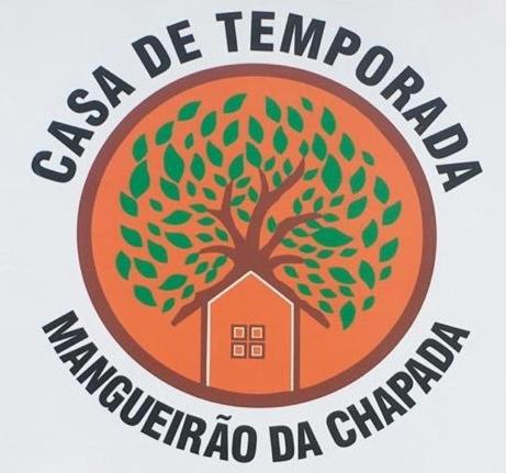 卡罗莱纳Casa para temporada - Chapada das Mesas的带有西班牙语的树标志
