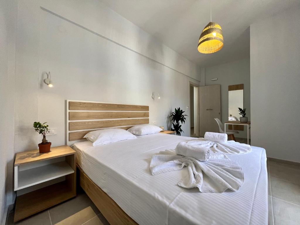 Issos Residence客房内的一张或多张床位