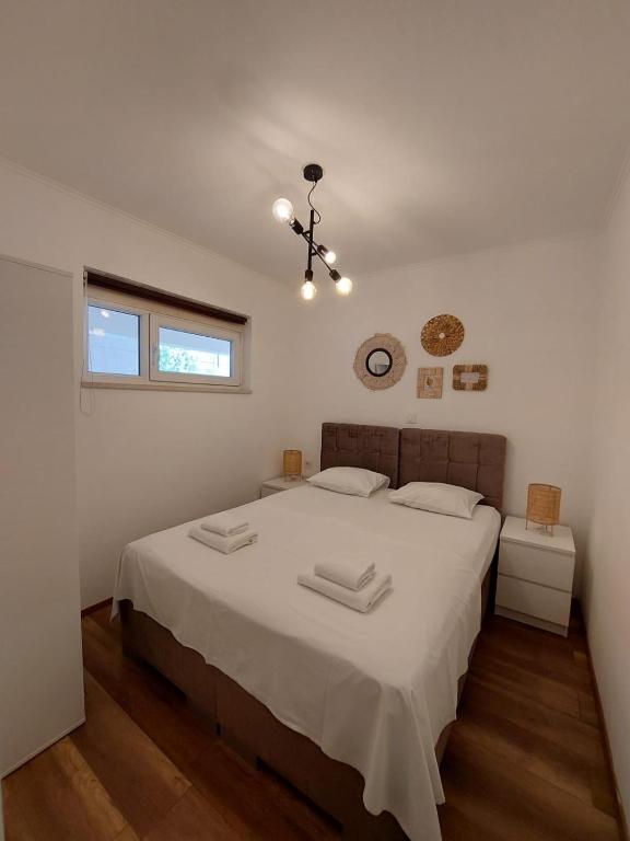 Apartments MilaRoza客房内的一张或多张床位
