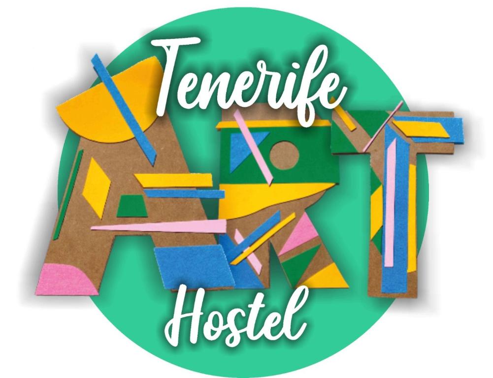 圣克鲁斯-德特内里费Tenerife Art Hostel的带有多彩纸的可怕旅馆标志