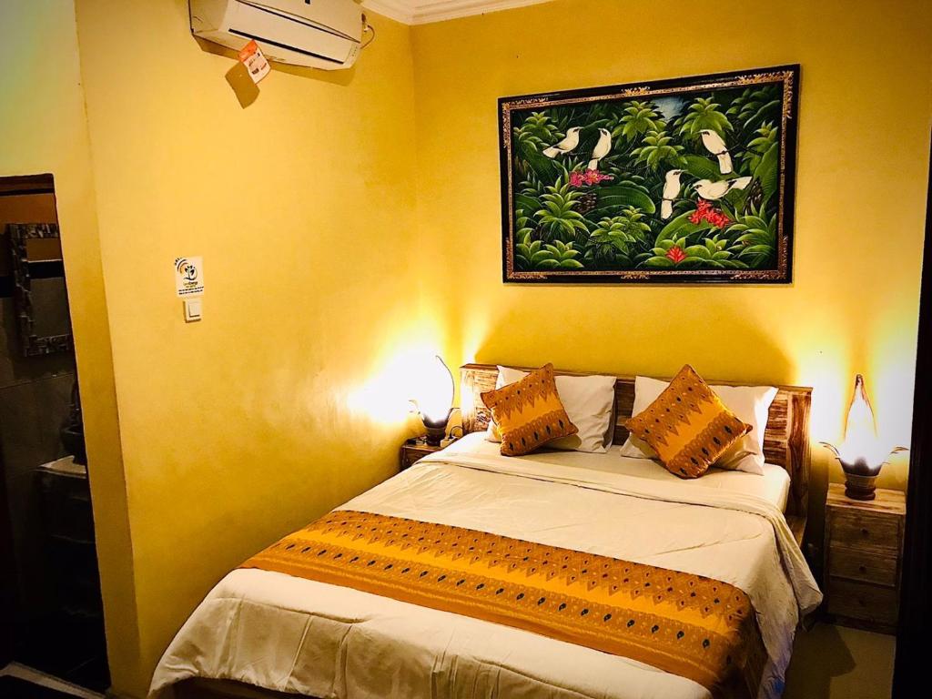 Ubud home stay客房内的一张或多张床位