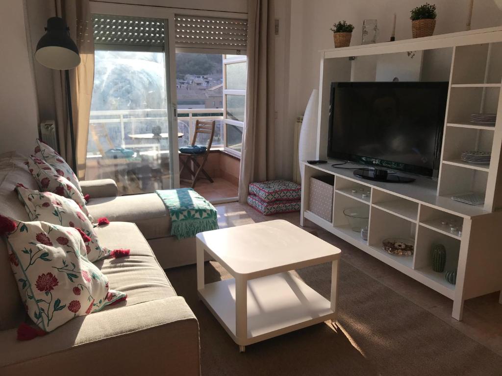 Apartamento recién reformado con vistas al río的休息区