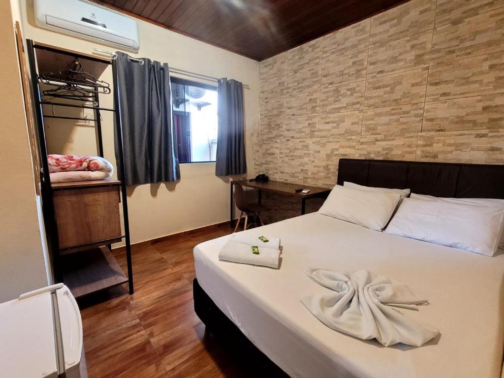 Hotel Serra do Mar客房内的一张或多张床位