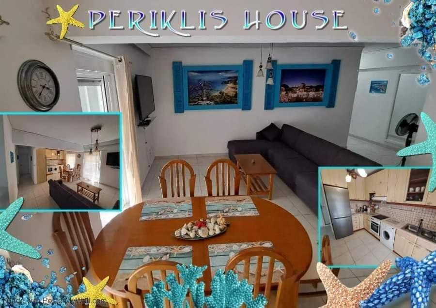 依克希亚Periklis House的厨房以及带桌子的客厅。
