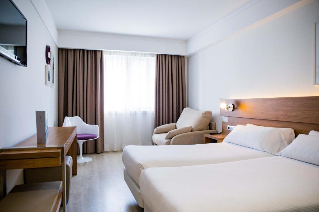 吉尔米瑞兹酒店客房内的一张或多张床位