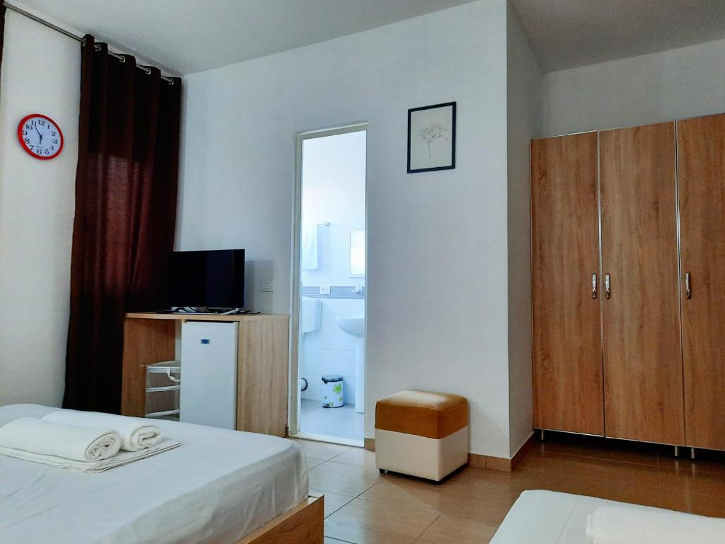 Apartments Alavana客房内的一张或多张床位
