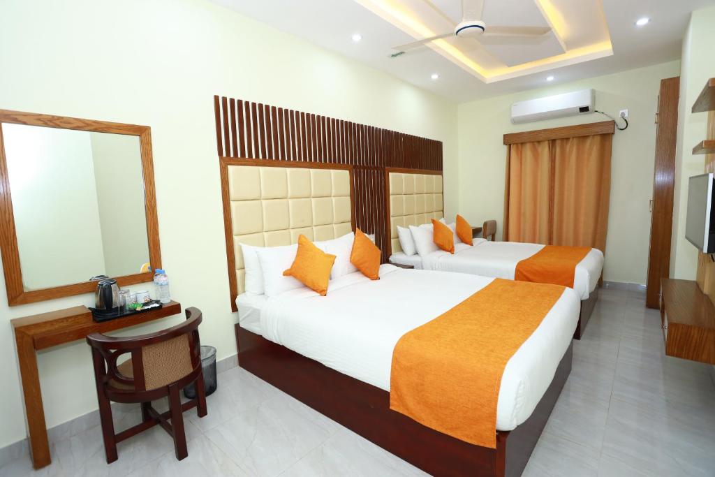 Jatra Grand Castle Hotel客房内的一张或多张床位