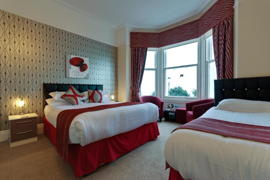 Lauriston &amp; Lawton Court Hotel客房内的一张或多张床位