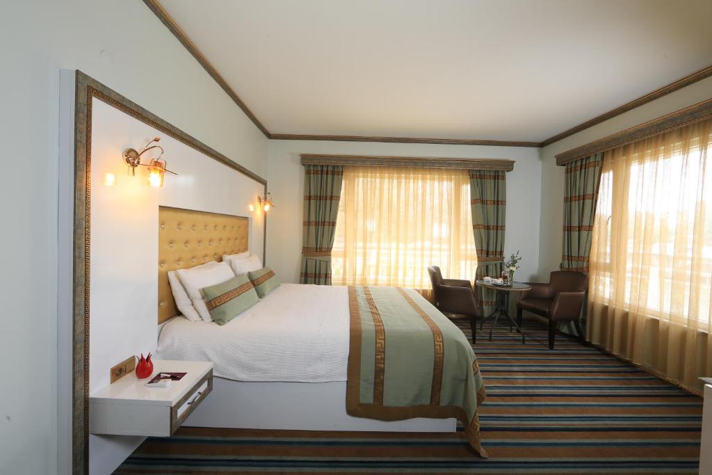 Lalehan Hotel Special Class客房内的一张或多张床位
