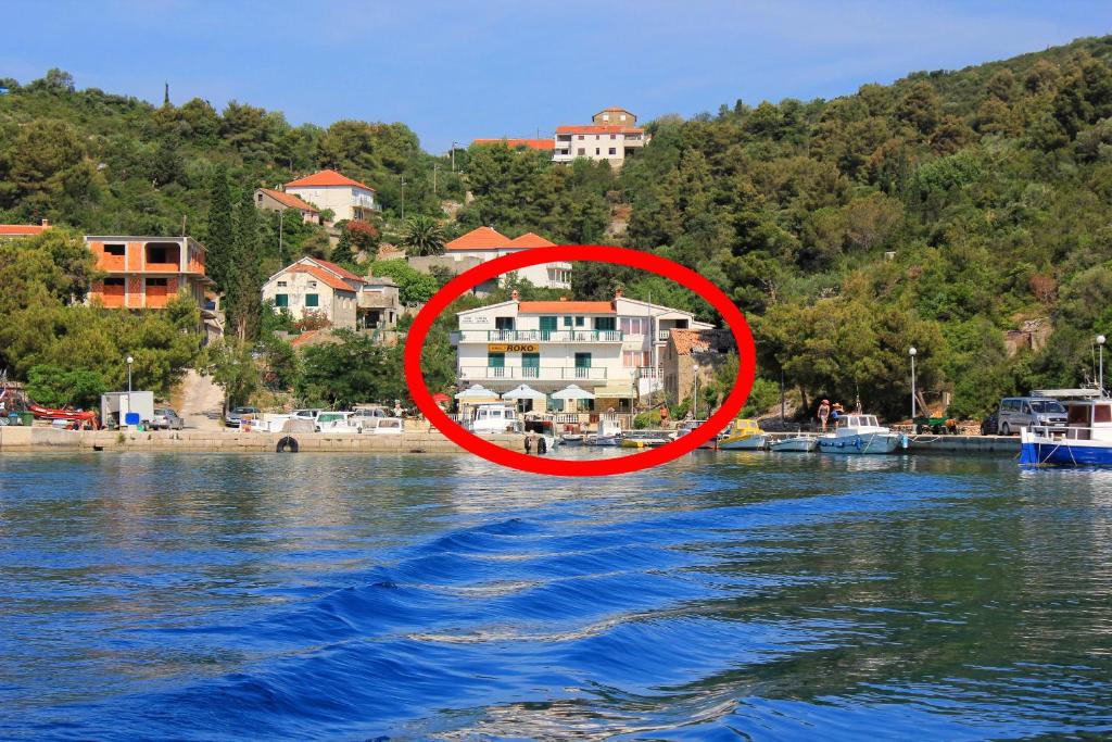 萨利Apartments and rooms by the sea Zaglav, Dugi otok - 393的水体中间的房子