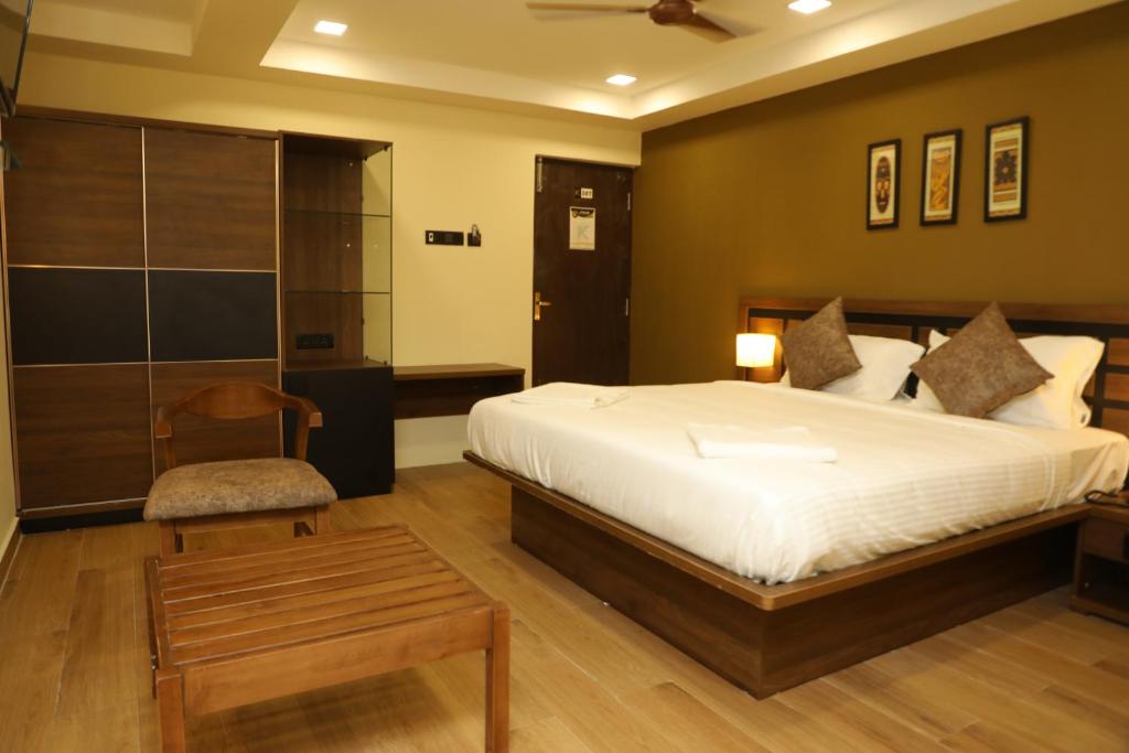 KANS ONE - Madipakkam客房内的一张或多张床位
