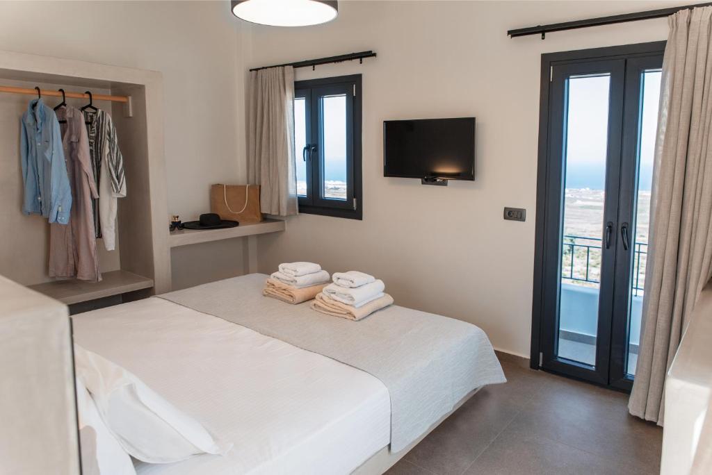 North Wind Luxury Suites客房内的一张或多张床位