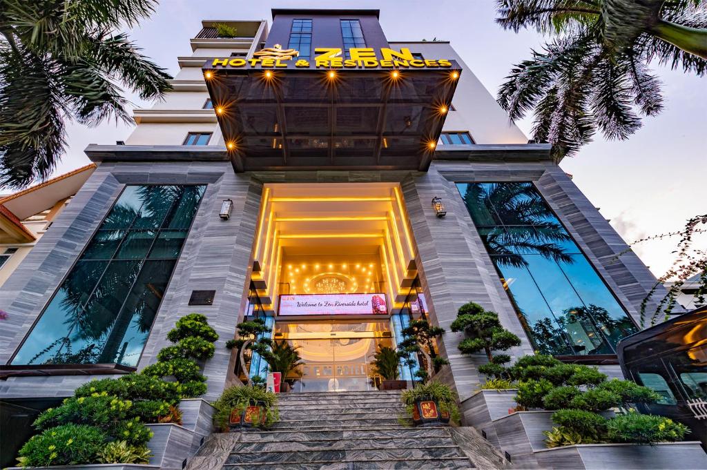 海防ZEN RIVERSIDE HOTEL & RESIDENCES的酒店前方的 ⁇ 染