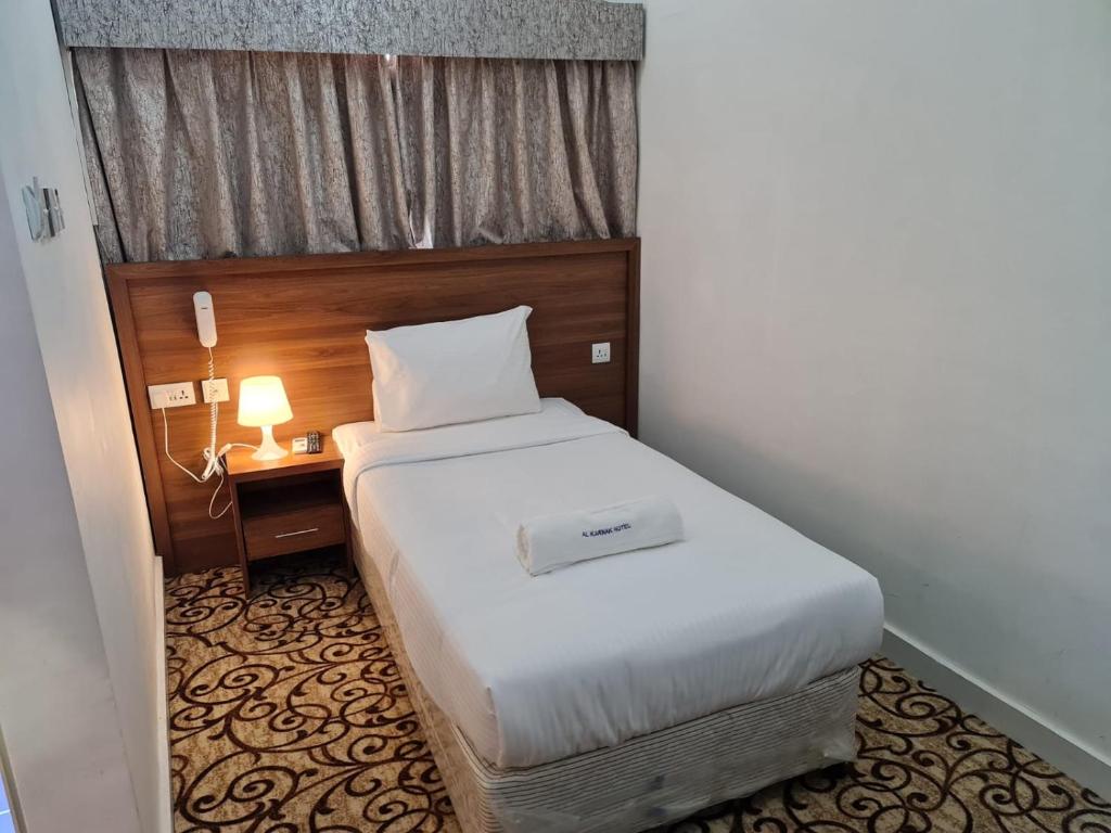 AL KARNAK HOTEL - BRANCH客房内的一张或多张床位