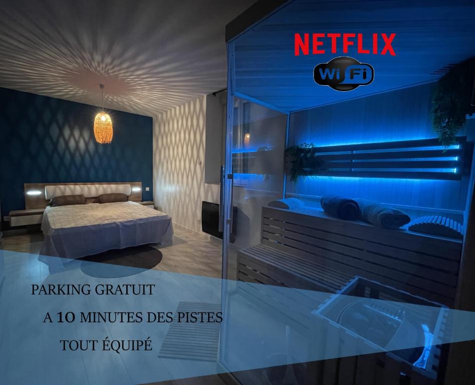 莫雷兹Sauna en bord de rivière的 ⁇ 染酒店带床和护身符的房间