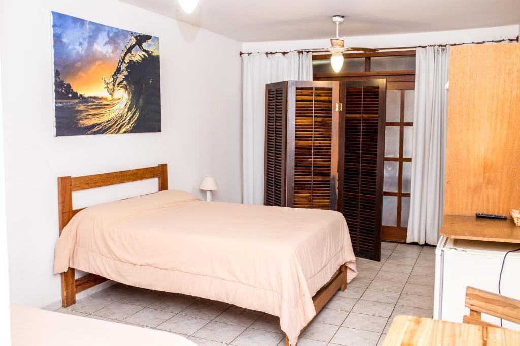 Vila Juquehy Lofts & Suítes客房内的一张或多张床位