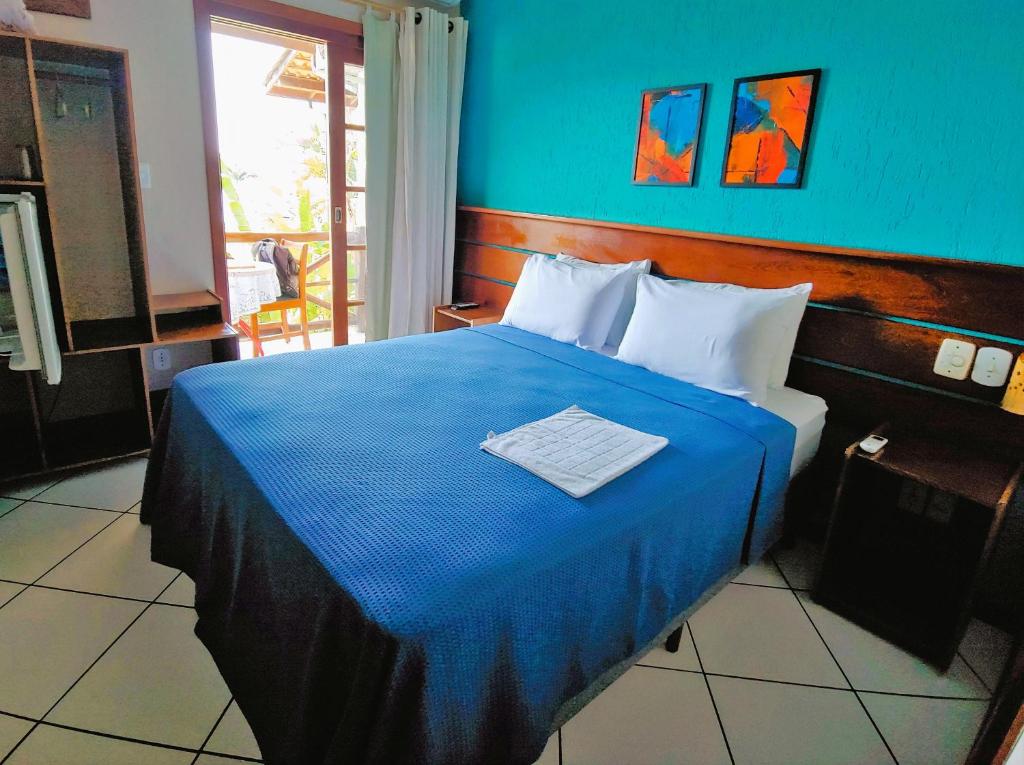 Pousada Aquarela do Mar客房内的一张或多张床位
