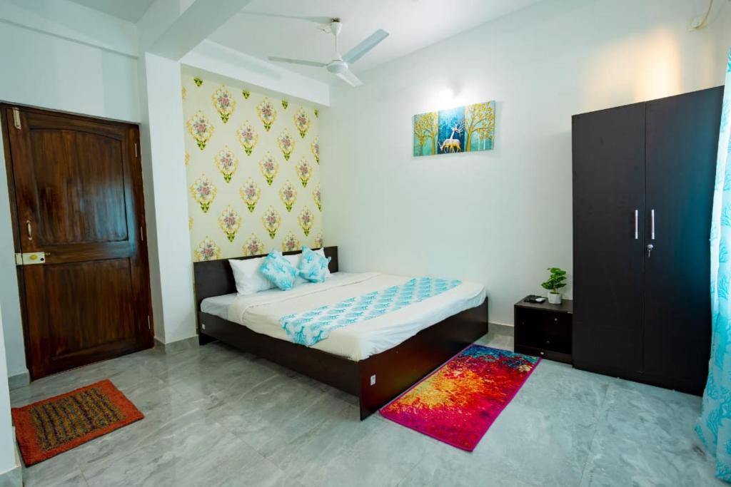 Goan Fiesta Studio CALANGUTE GOA客房内的一张或多张床位