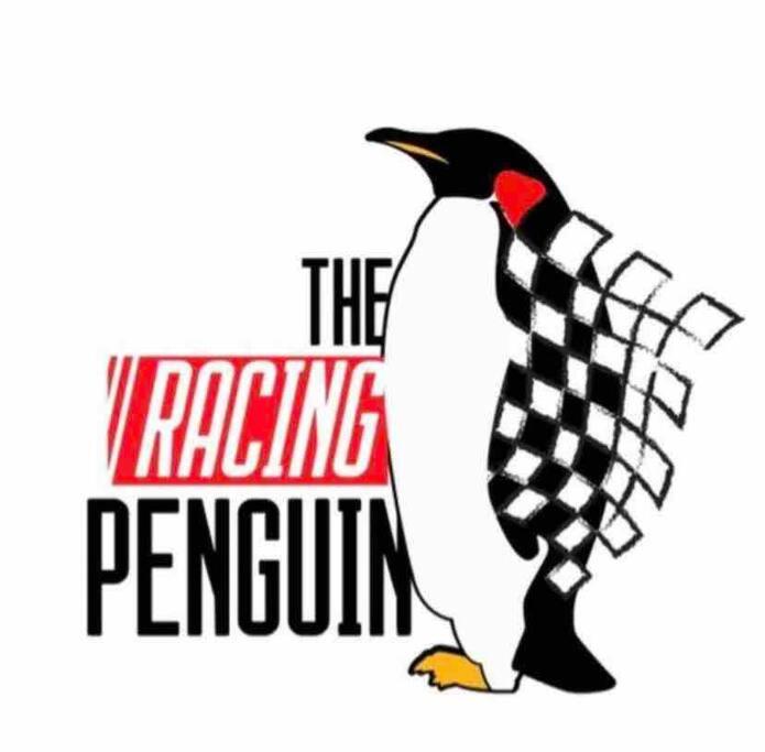 日落大道Racing Penguin Surf Grand Prix Walk Phillip Island的企鹅标志与赛企鹅