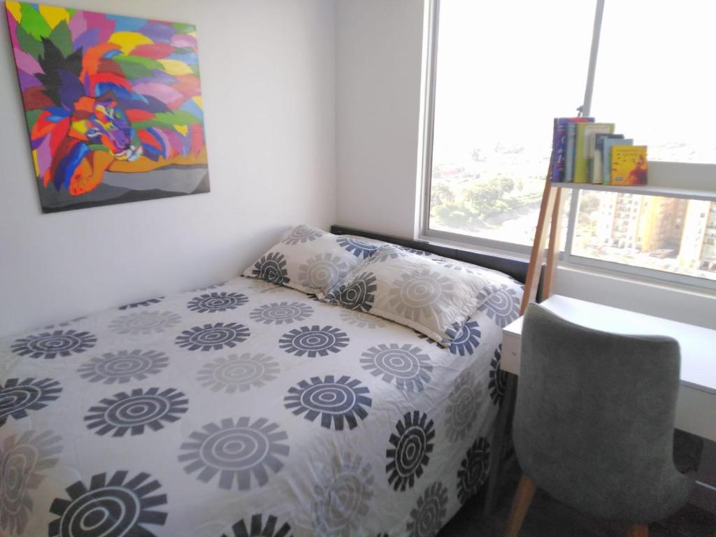 Habitación privada cómoda vista Bogotá客房内的一张或多张床位