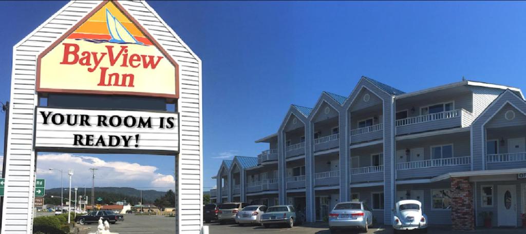 新奥尔良市Bayview Inn的和酒店同在建筑前的标志