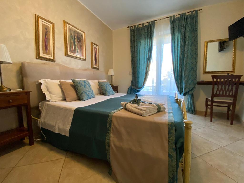 B&amp;B MareAgrò客房内的一张或多张床位