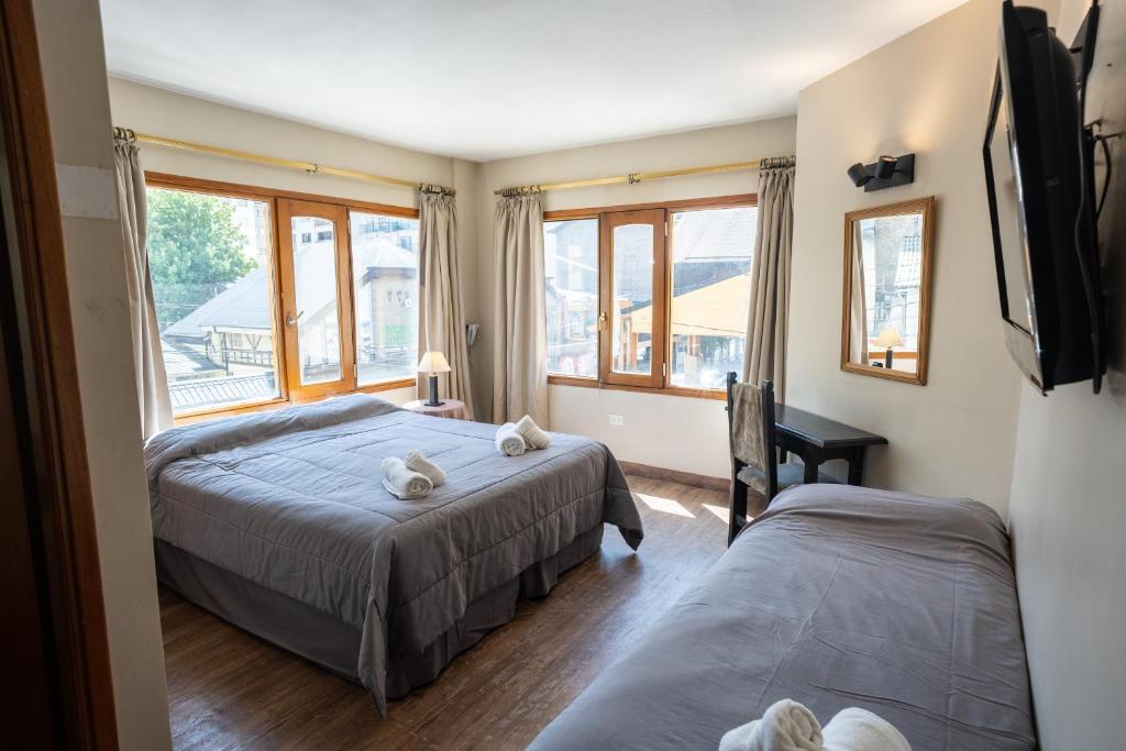 Hotel Park Bariloche客房内的一张或多张床位