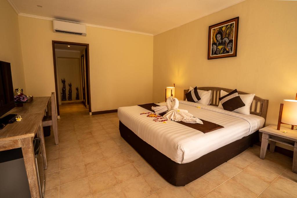 New Sunari Lovina Beach Resort客房内的一张或多张床位