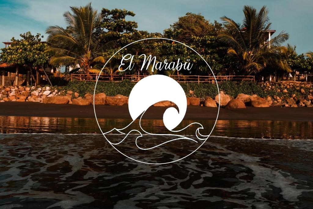 AposentilloEl Marabu Surf Resort的标有“蜂蜜度假村”名称的标志