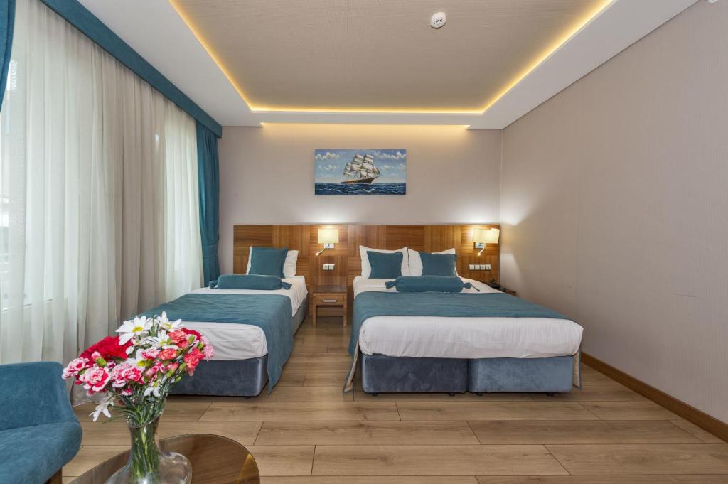 伊斯坦布尔老城梅里托酒店客房内的一张或多张床位