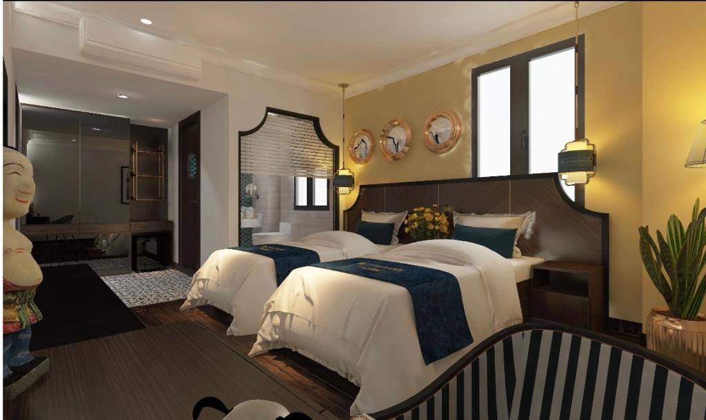 下龙湾Ha Long Essence Premium Hotel的一间带两张床的卧室和一间浴室