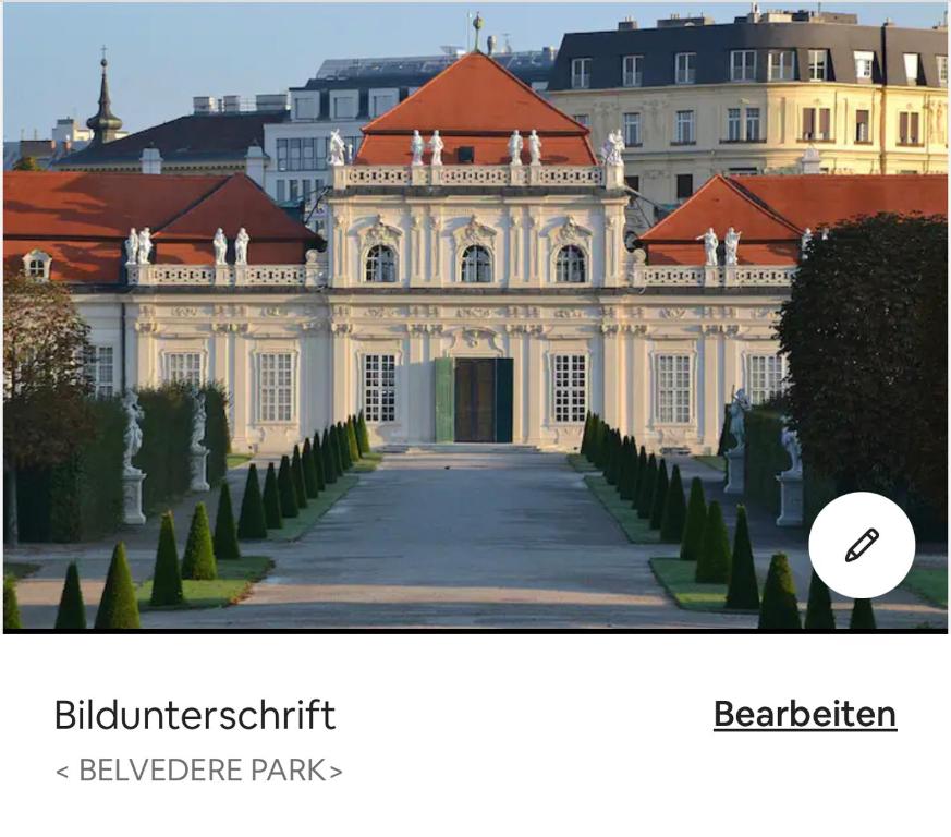 维也纳Sehr Zentrale Wohnung-Loftstyle-的一张白色建筑的照片,上面写着“蓝 ⁇ 鹿公园”