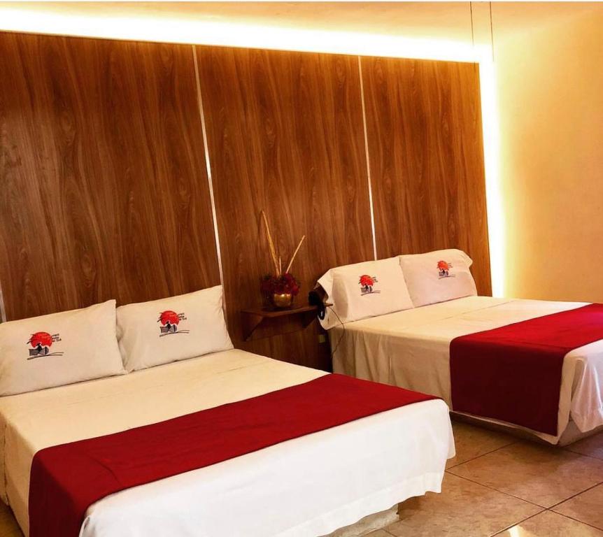 Hotel y Restaurant Puesta del Sol客房内的一张或多张床位