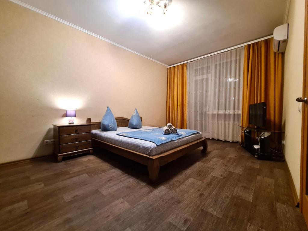 1-room Luxury Apartment on Sobornyi Avenue 170-v, by GrandHome客房内的一张或多张床位
