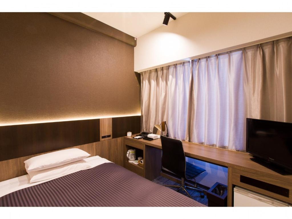 Ochanomizu Inn - Vacation STAY 90241v客房内的一张或多张床位
