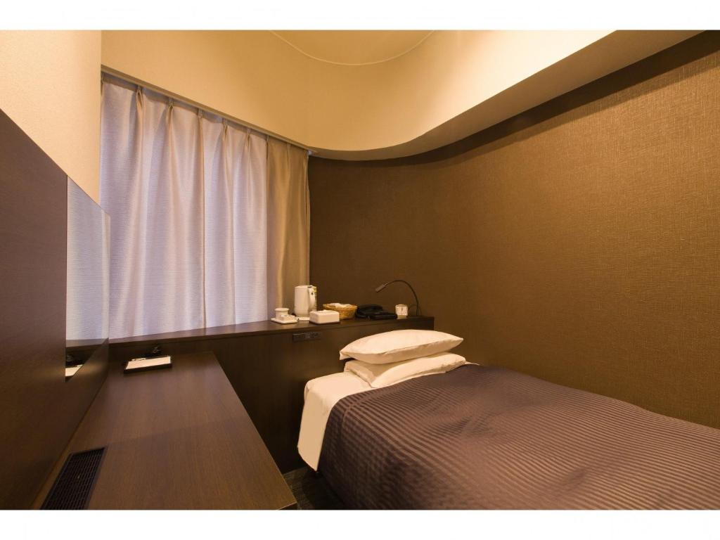Ochanomizu Inn - Vacation STAY 90281v客房内的一张或多张床位
