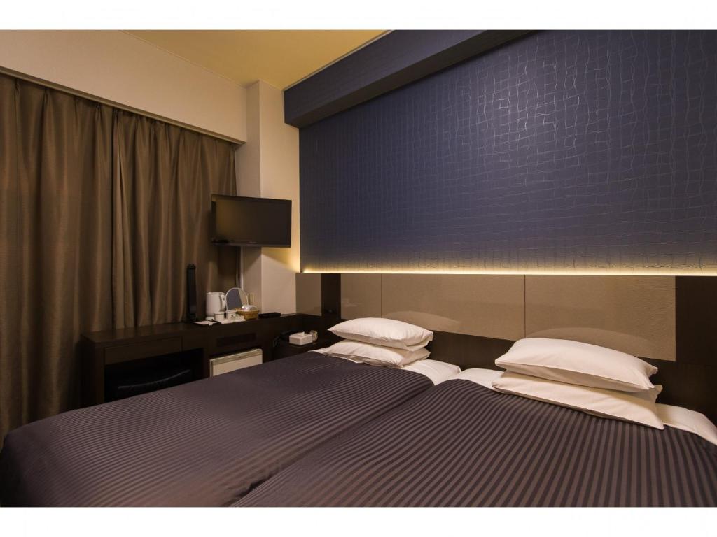 Ochanomizu Inn - Vacation STAY 90285v客房内的一张或多张床位